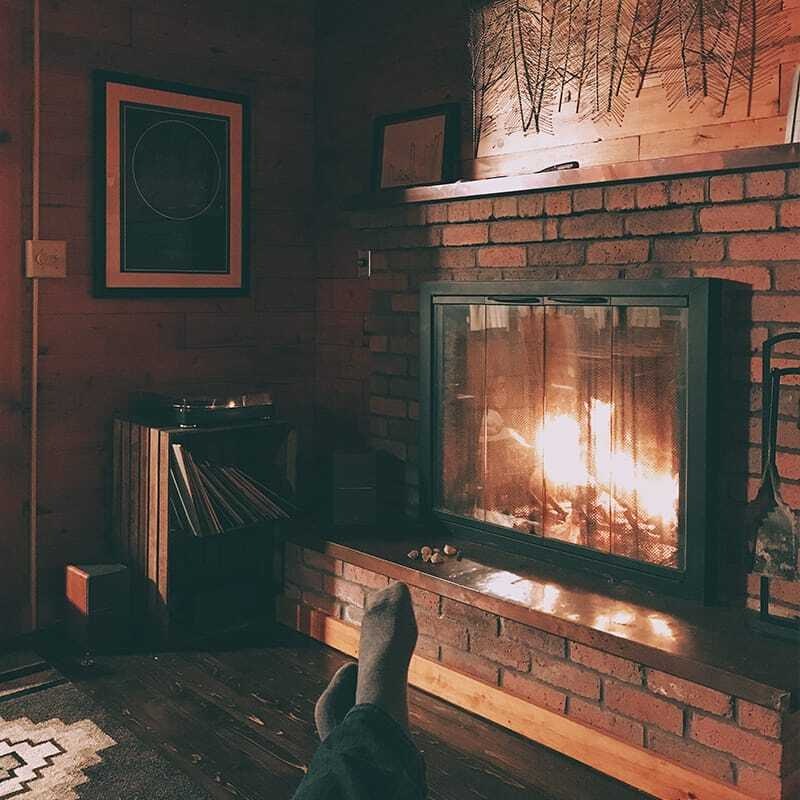 Warming up with a fire at Craig's cabin in New Hampshire